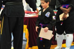 Nicholas wins promotion to red belt!