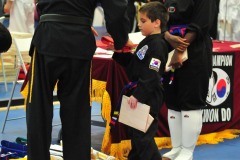 Nicholas wins promotion to red belt!