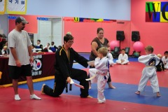 Brandon blasts through the board during his breaking demonstration...