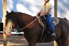 He's sitting tall in that saddle!