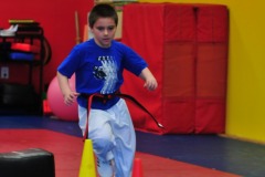 Nicholas weaving to touch the final cone...