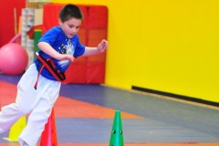 Nicholas weaving to touch the final cone...