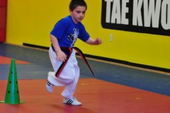 Nicholas weaving to touch the final cone...