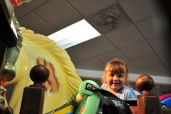 Katie riding the rocking horse...