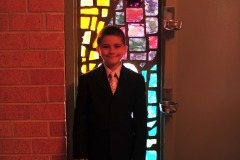 Nicholas nicely framed by the stained glass window...