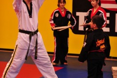 Double roundhouse kick makes short work of the second board...