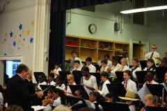 The full band playing the theme to <B>Hawaii 5-0</B>...