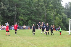 Nicholas takes a shot on goal...