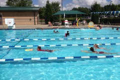Nicholas working the kick board...