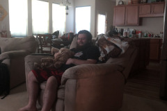 Nick with a wiggly lap full o' labradoodle!